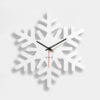 orologio a forma di fiocco di neve bianco